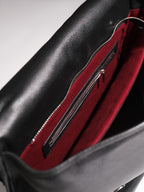 Black Amari top grain leather backpack interior laptop compartment and zip pocket