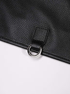 Black Amari top grain leather backpack silver hardware close up