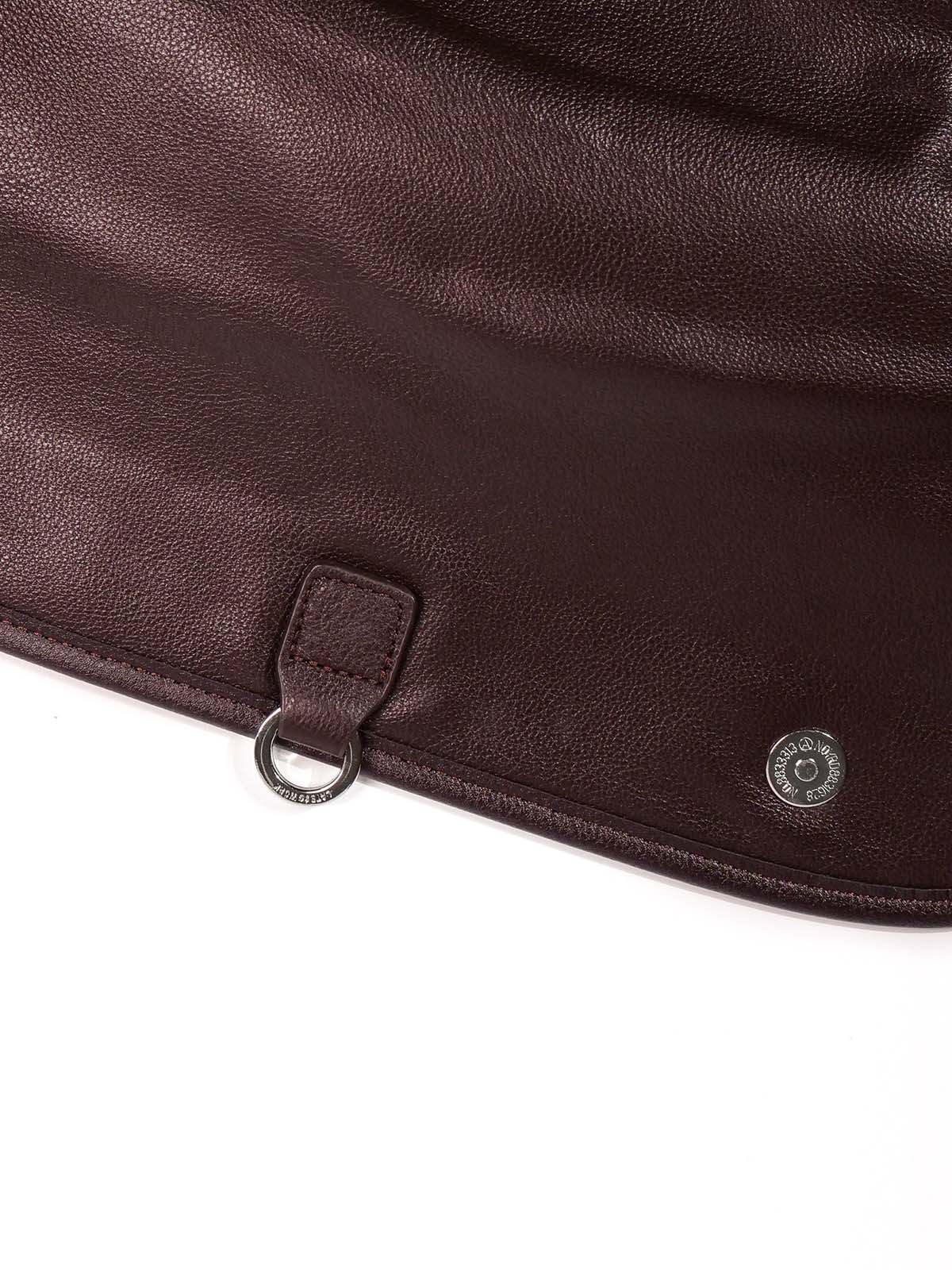 Brown Amari top grain leather backpack close up magnetic closure