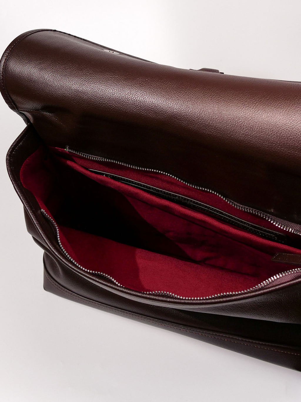 Brown Amari top grain leather backpack interior laptop compartment