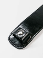 Close up of shoulder pad button
