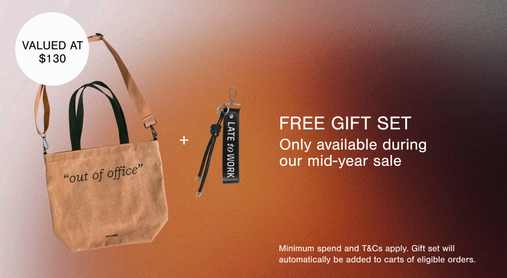 Tan tote bag with 'out of office' text and keychain on an orange gradient background, promoting a free gift set offer.