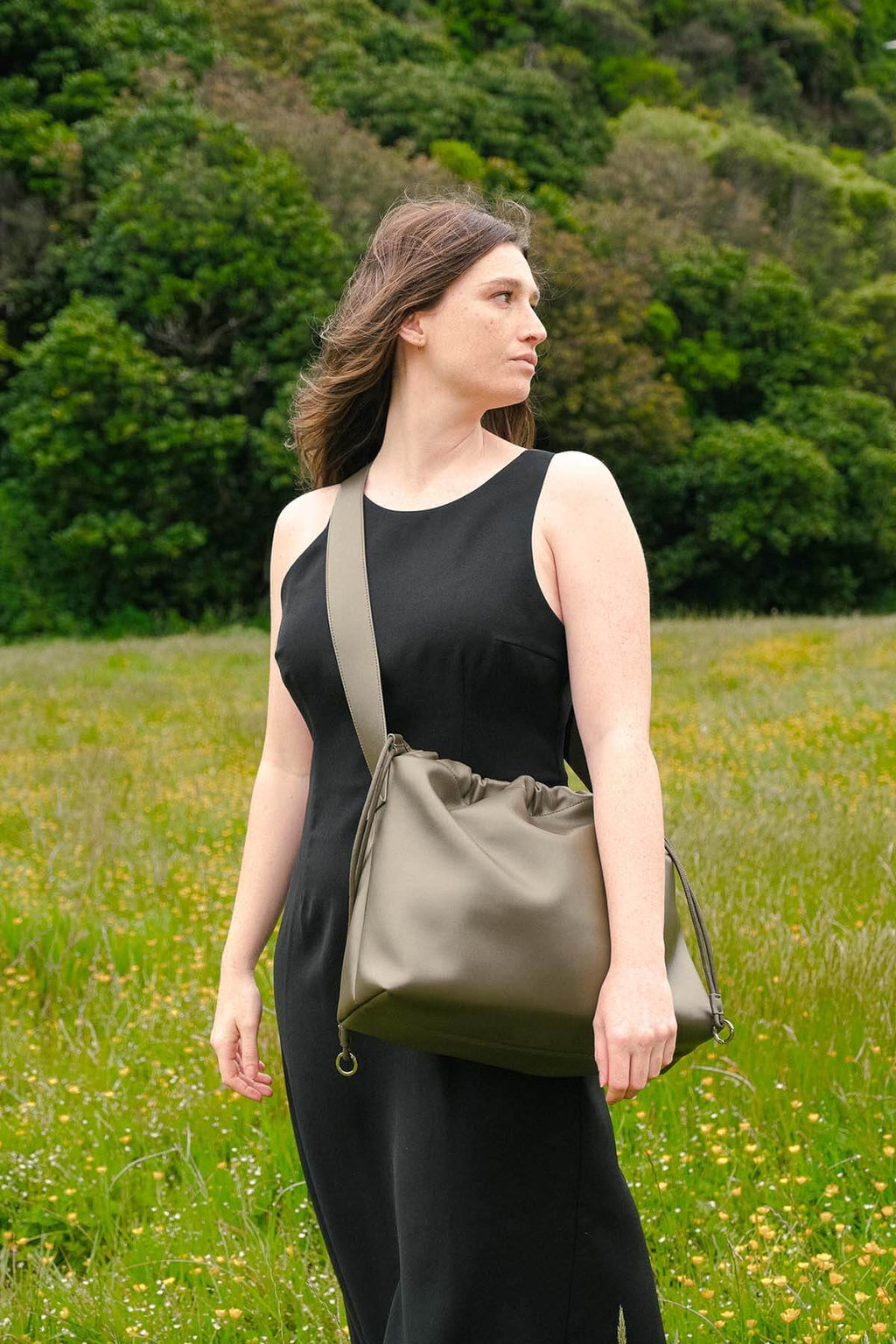 Sage Bag in green genuine leather worn crossbody