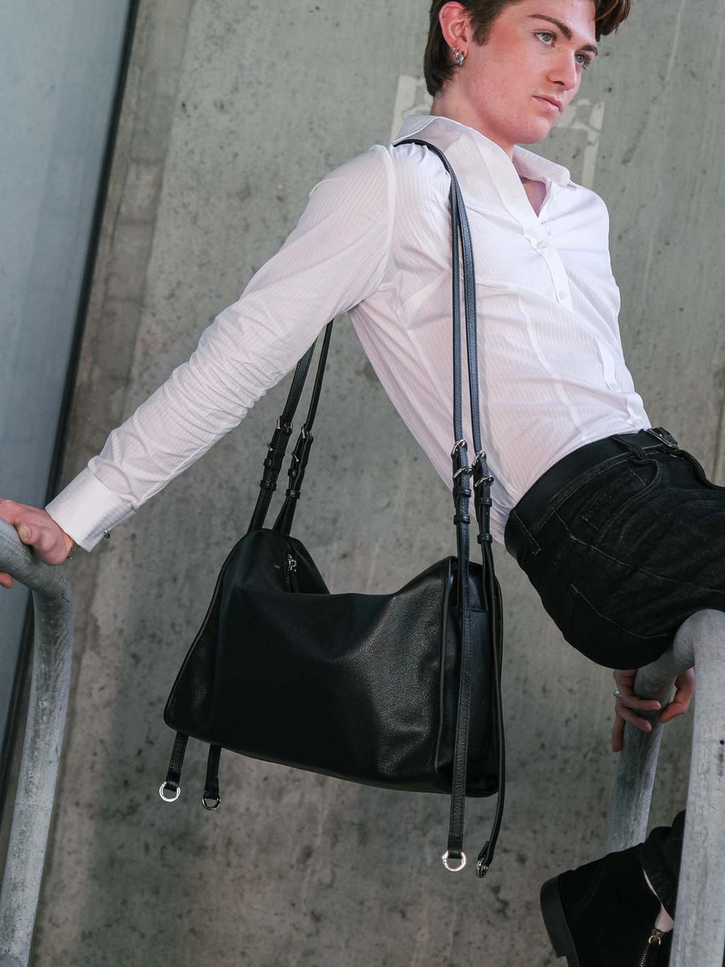 Black Willow Bag worn on one shoulder