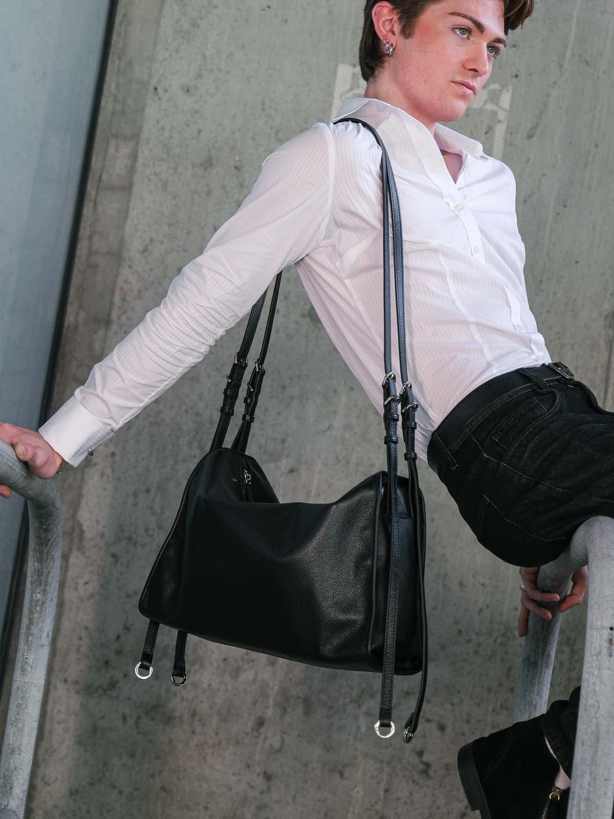 Black Willow Bag worn on one shoulder