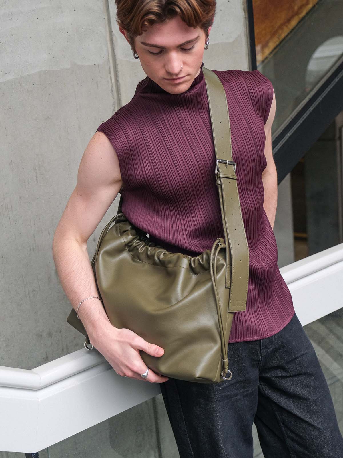 Sage Bag in green genuine leather worn crossbody