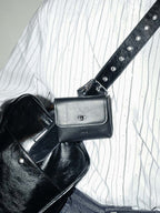 Finlay leather mini bag charm black clipped on bag