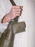 Finlay leather mini bag charm green clipped on green bag