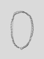 Francisco stainless steel necklace on plain background