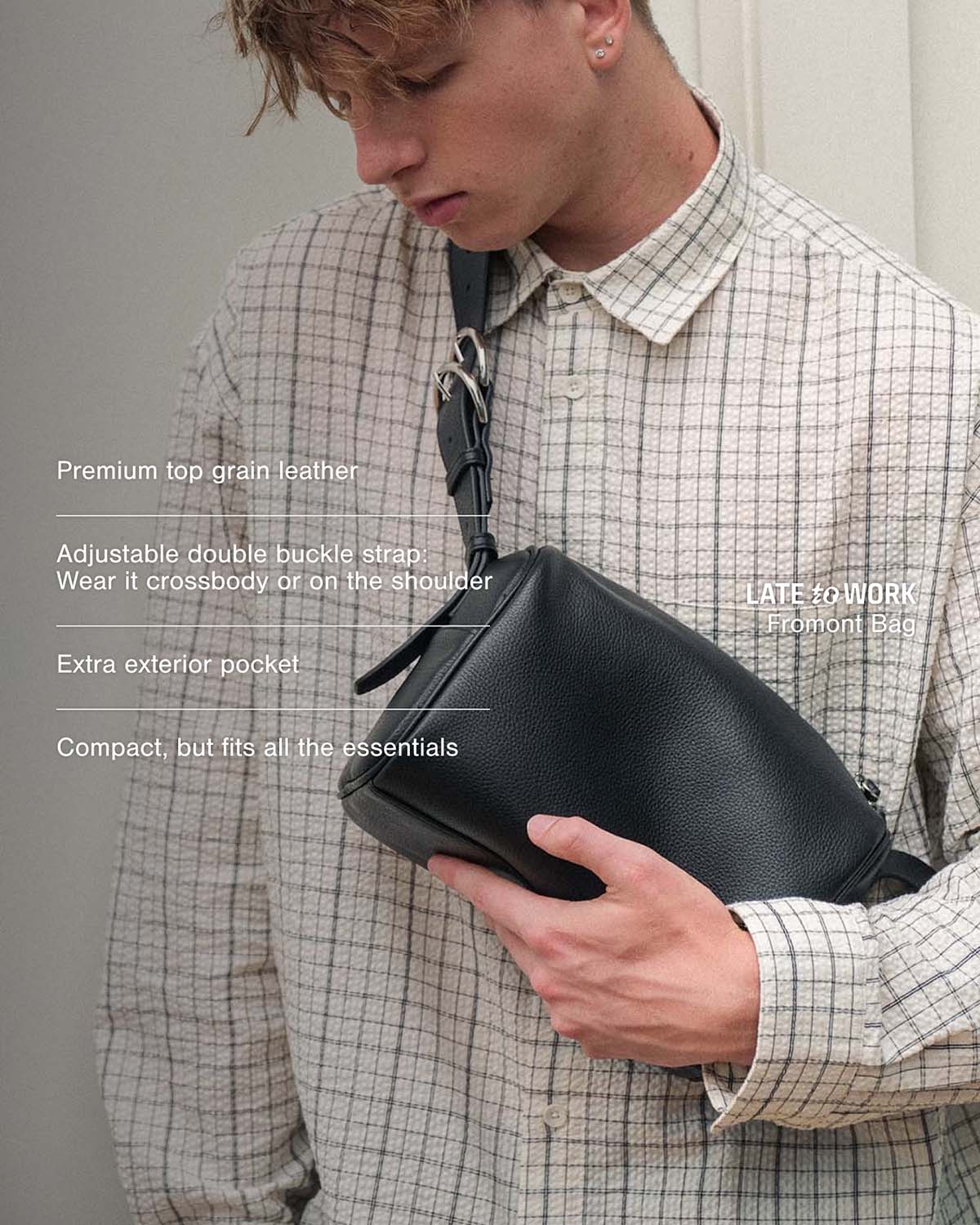 Black Fromont top grain leather crossbody bag worn crossbody on front