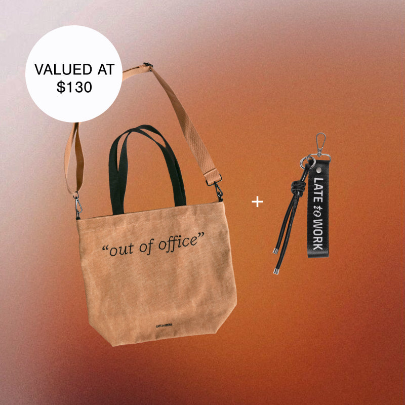 Brown tote bag with 'out of office' text and keychain on an orange gradient background
