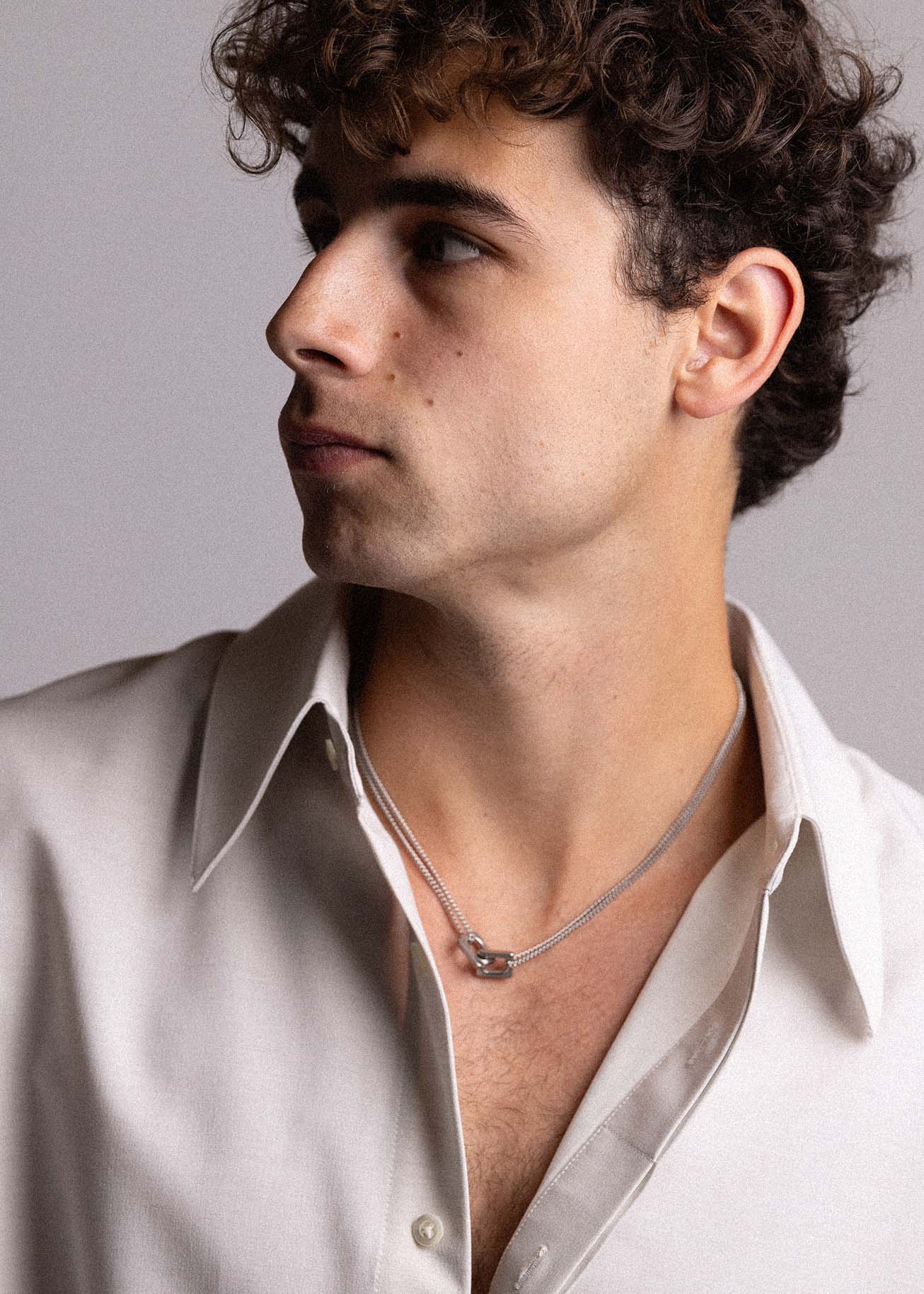 Sterling silver Kaitlin necklace on male model