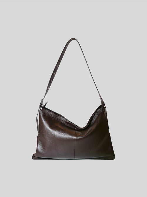 Top-grain Luxe Kite Bag in brown isolated on a grey background
