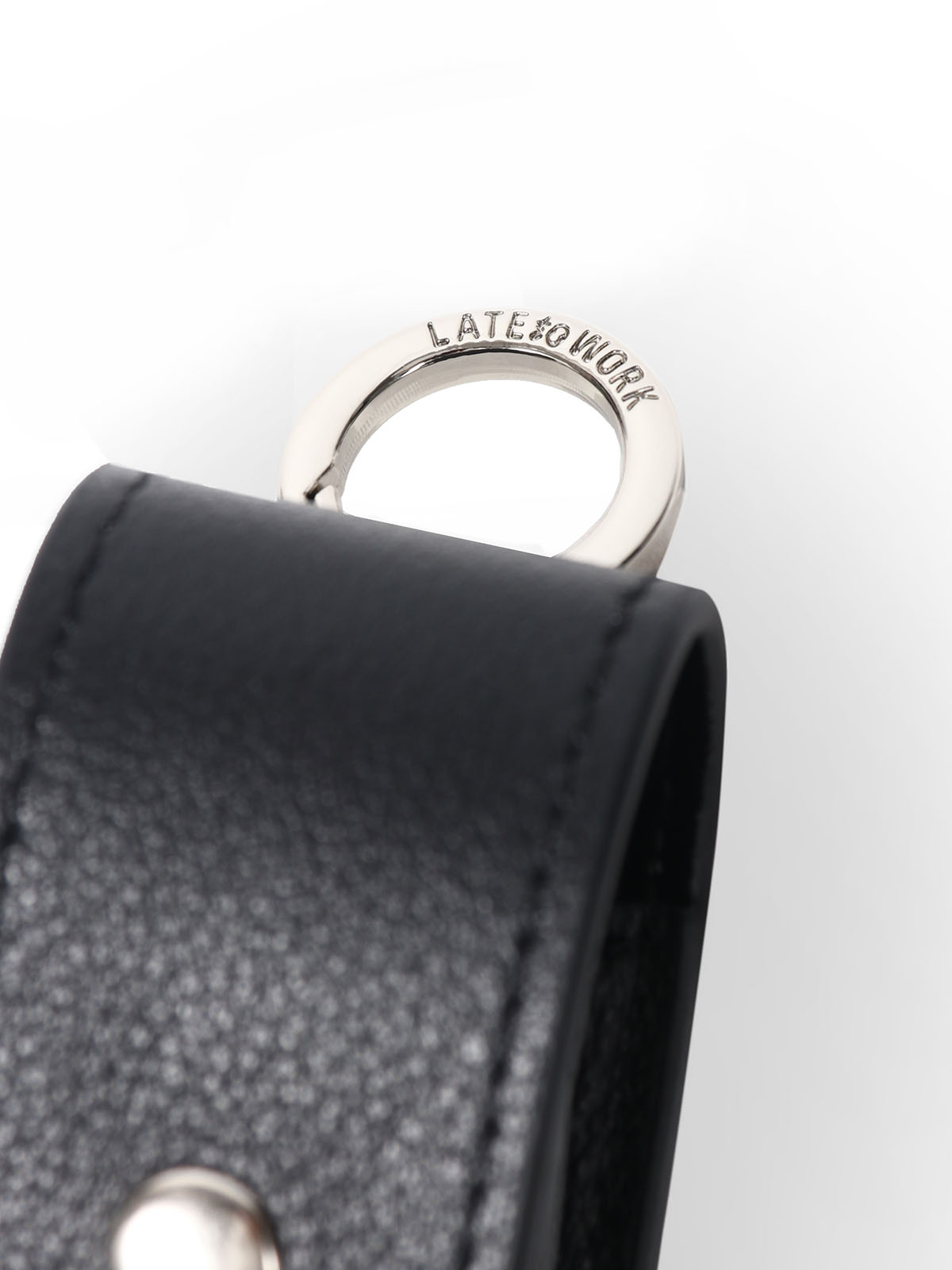 Leather lip balm case close up on metal hardware