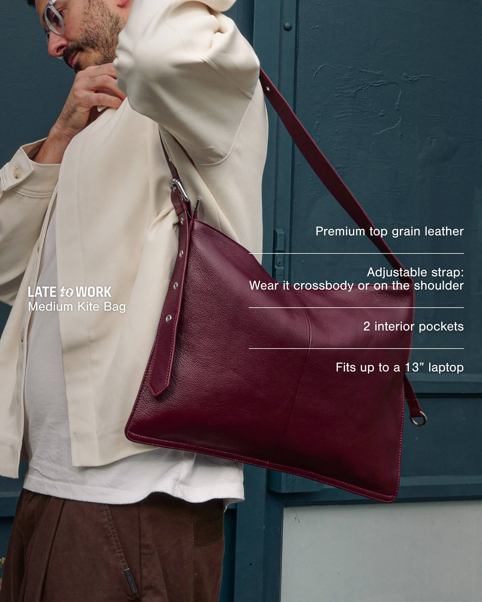 Medium burgundy Kite Bag with product features overlay: premium top grain leather, adjustable strap, 2 interior pockets, fits up to a 13-inch laptop