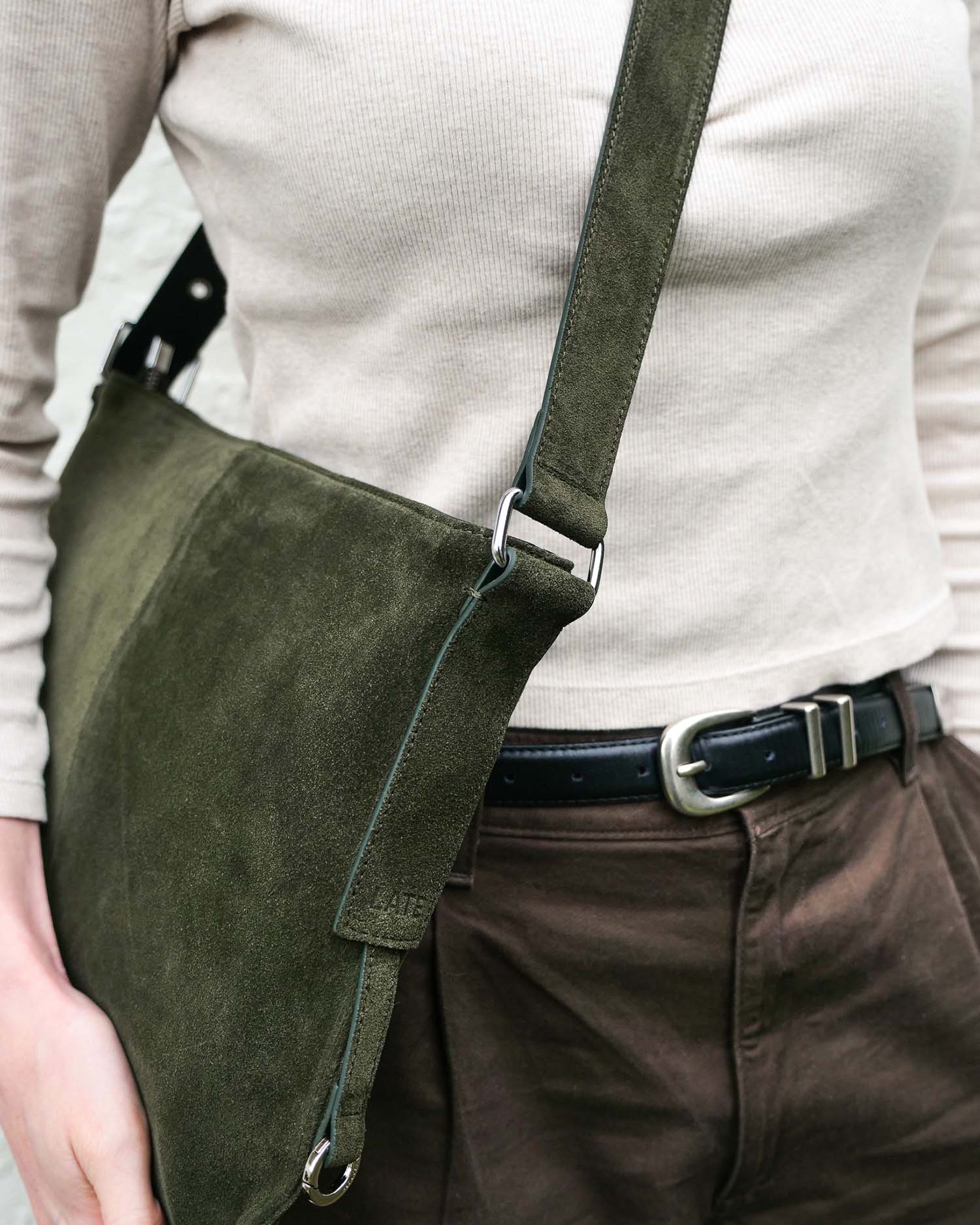 Close up of the Medium Kite Bag's silver hardware