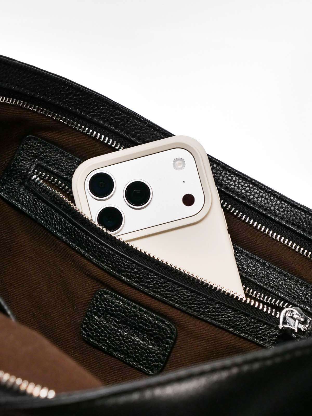 Close up interior pocket with iPhone inside