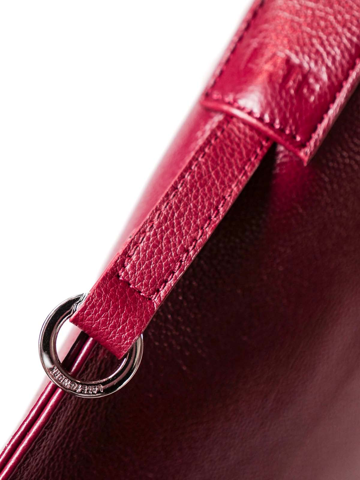 Close up of side of bag, showing silver clip ring hardware