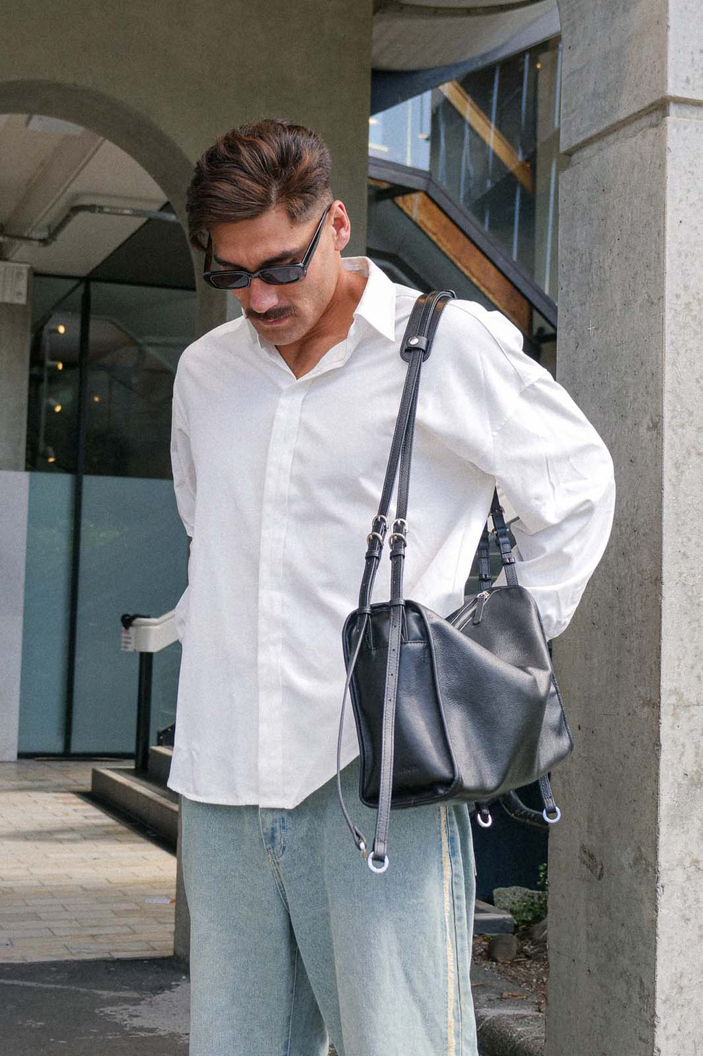 Black Willow Bag with shoulder pad attached worn on one shoulder