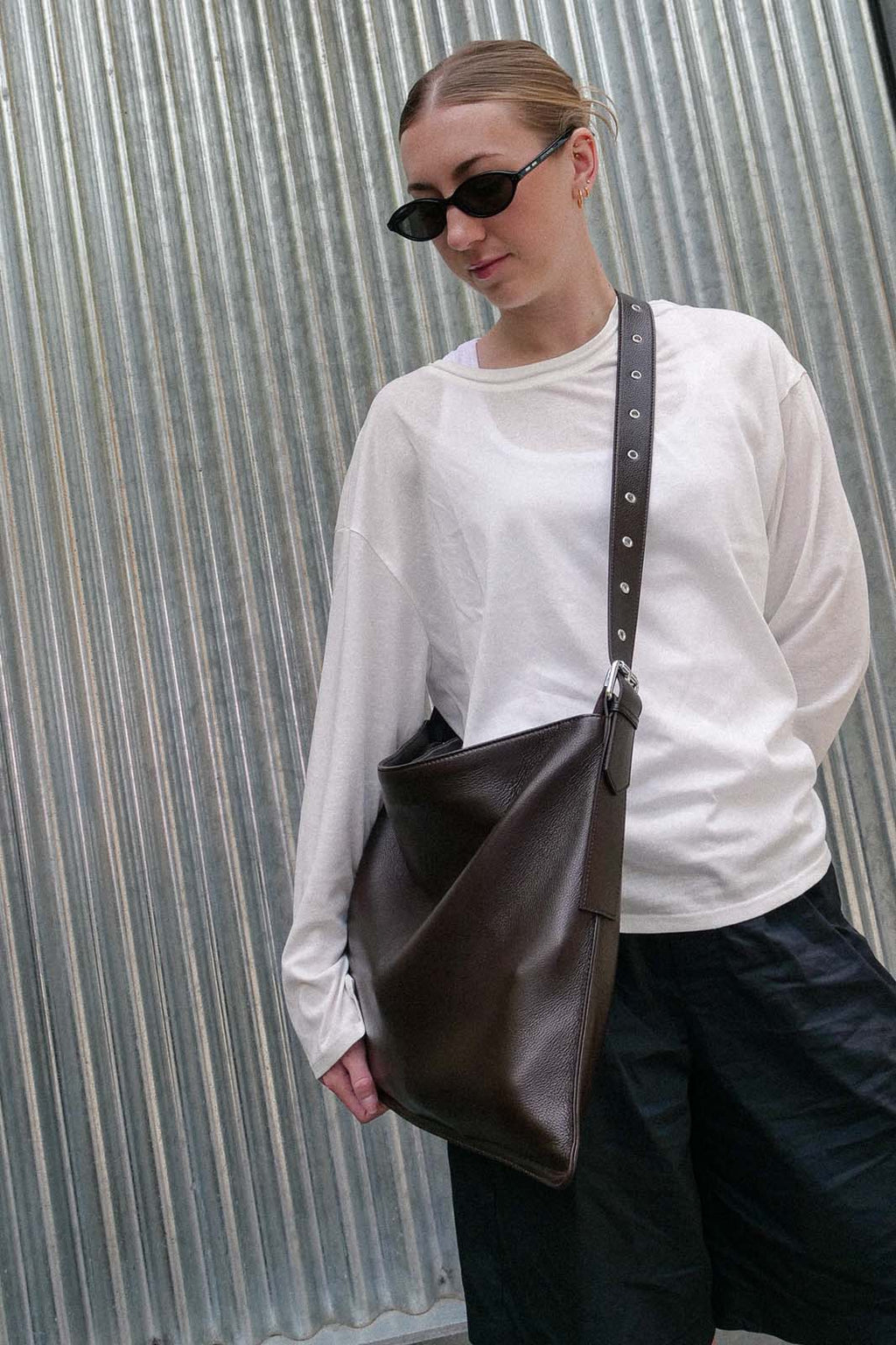 Brown Luxe Kite Bag worn crossbody
