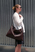 Brown Luxe Kite Bag worn on one shoulder