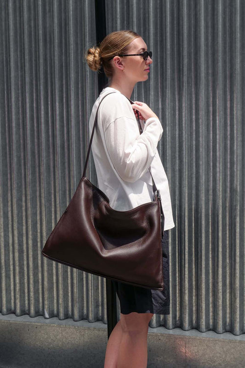 Brown Luxe Kite Bag worn on one shoulder