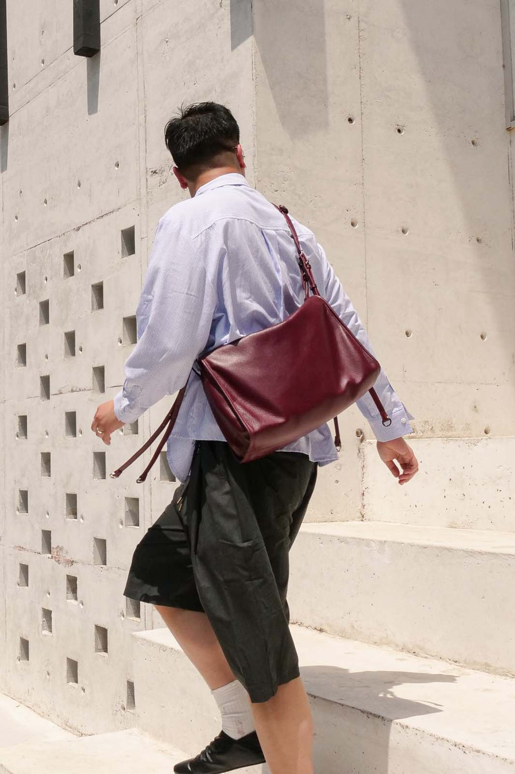 Burgundy Willow Bag worn crossbody on back
