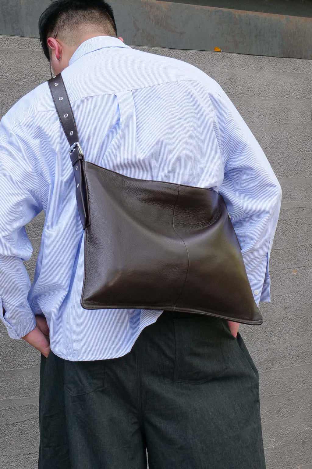 Brown Luxe Kite Bag worn crossbody from behind