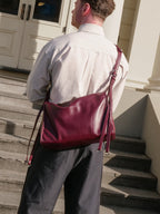 Burgundy Willow Bag worn crossbody on back