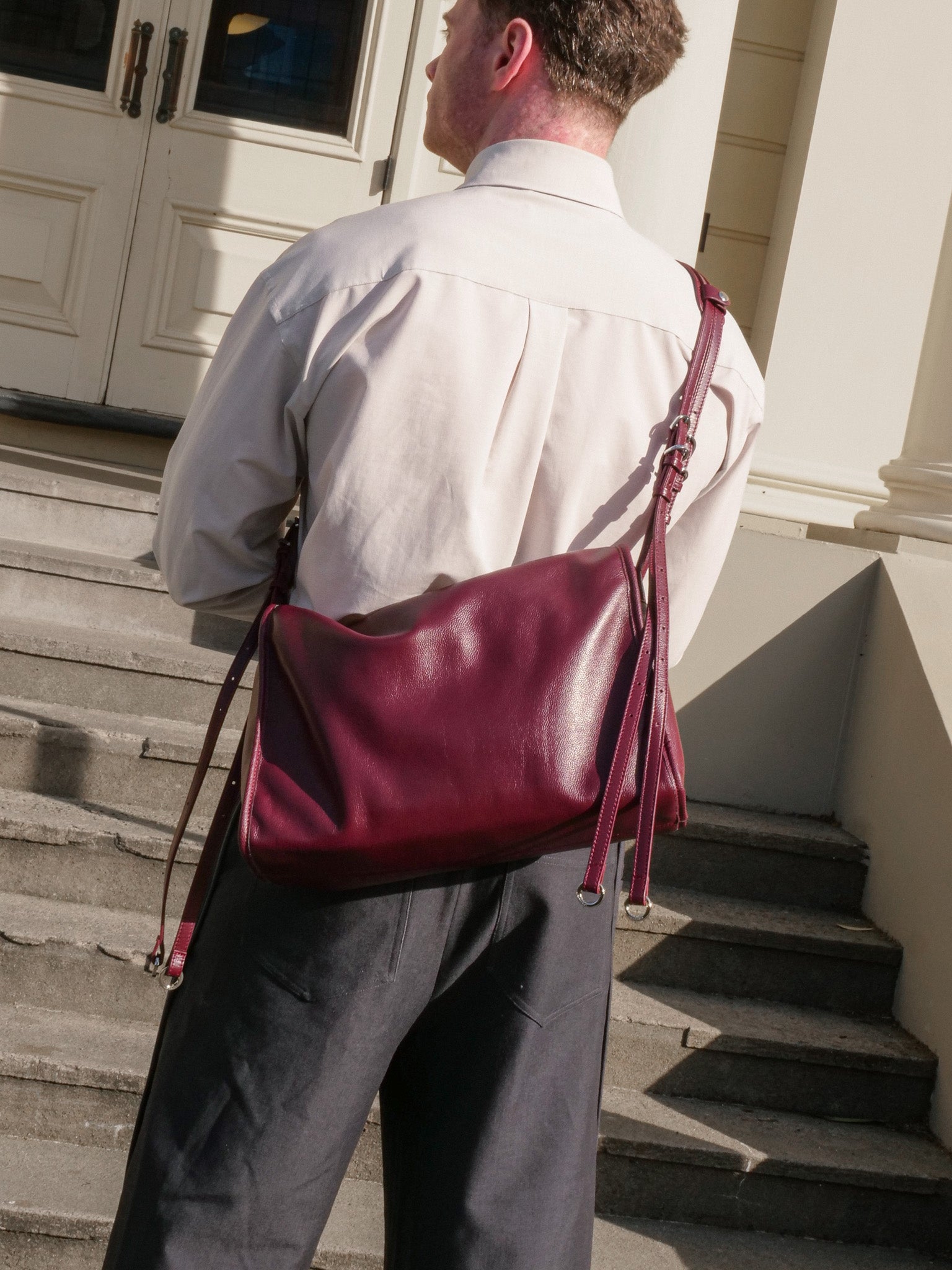 Burgundy Willow Bag worn crossbody on back