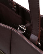 Close up of silver hardware and toggle closure