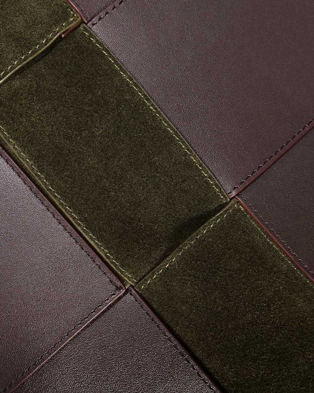 Close up of brown nappa leather and green suede