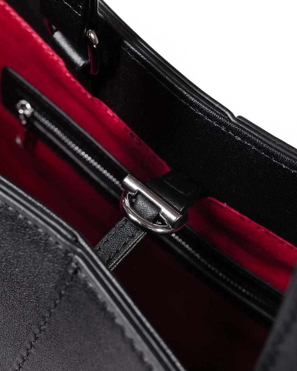Close up of silver hardware and toggle closure