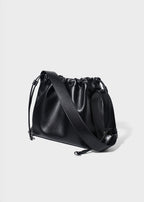 Sage crossbody bag black genuine leather 45degree angle view