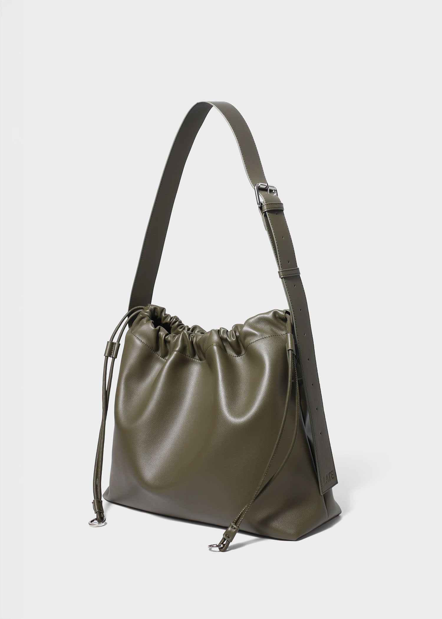 Sage crossbody bag green genuine leather 45degree angle view