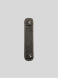 Forest suede shoulder pad on a grey background