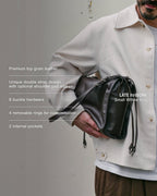 Small brown Willow Bag with product features overlay: premium top grain leather, unique double strap design, 8 buckle hardware, 4 removable rings for customisation, 2 internal pockets