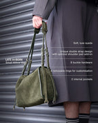 Small Willow Green Suede description: Soft, luxe suede, Unique double strap design, 8 buckle hardware, 4 removable rings and 2 internal pockets.