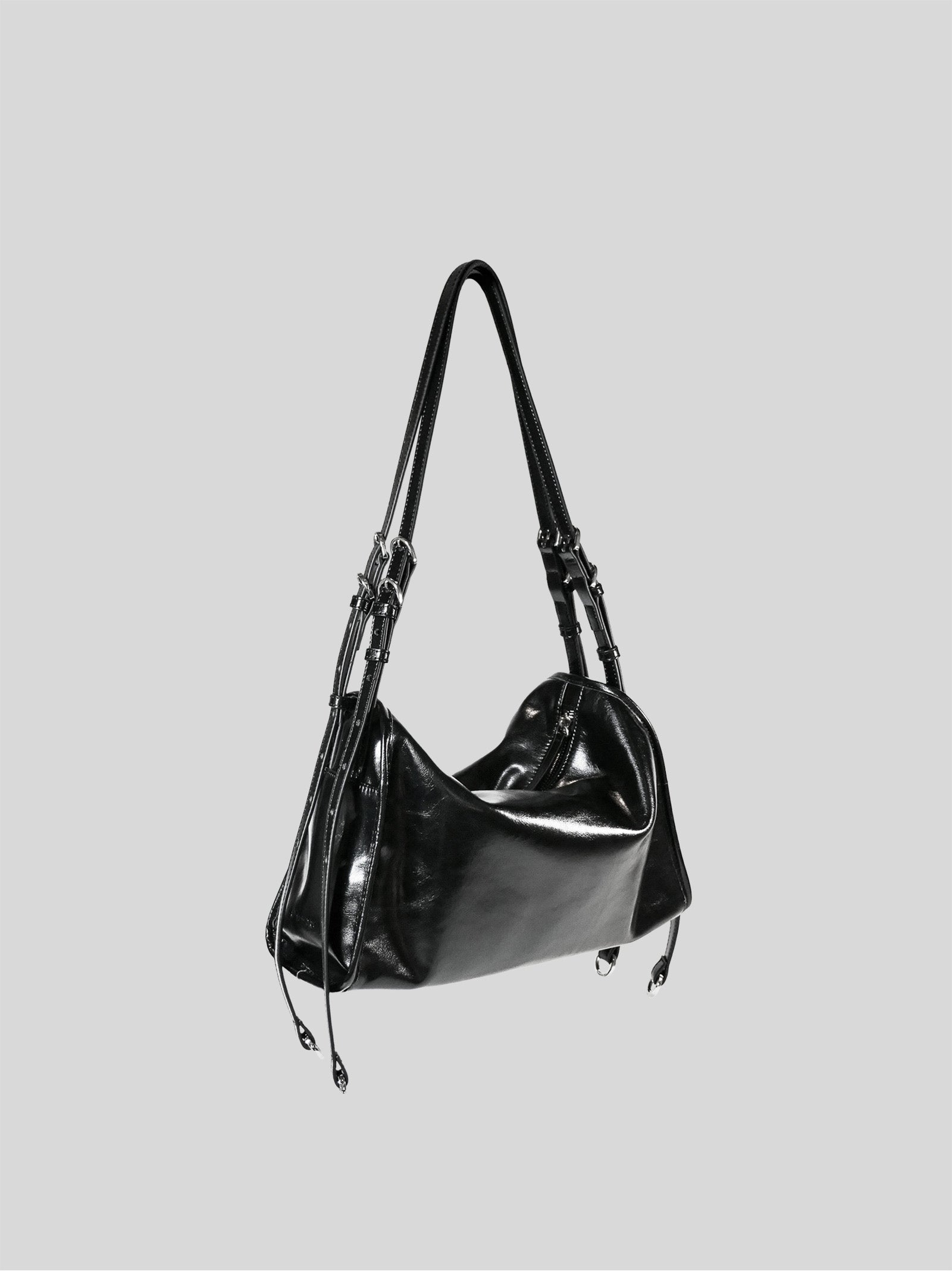 Small black Willow Bag 45 degrees on a plain grey background