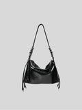 Small black Willow Bag on a plain grey background