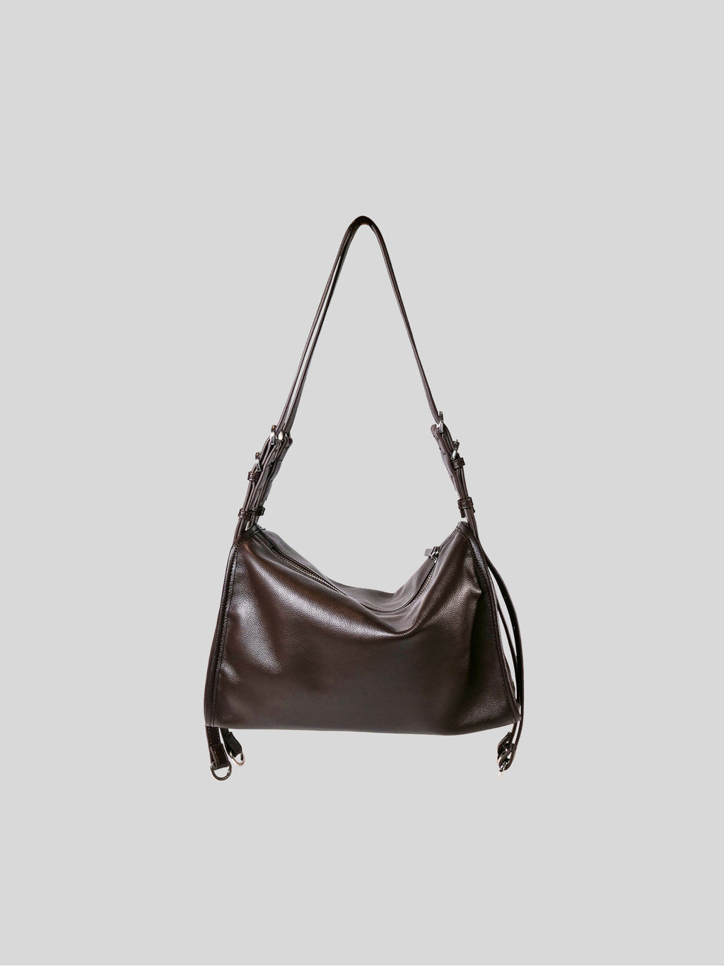 Small top-grain brown Willow Bag on a plain grey background