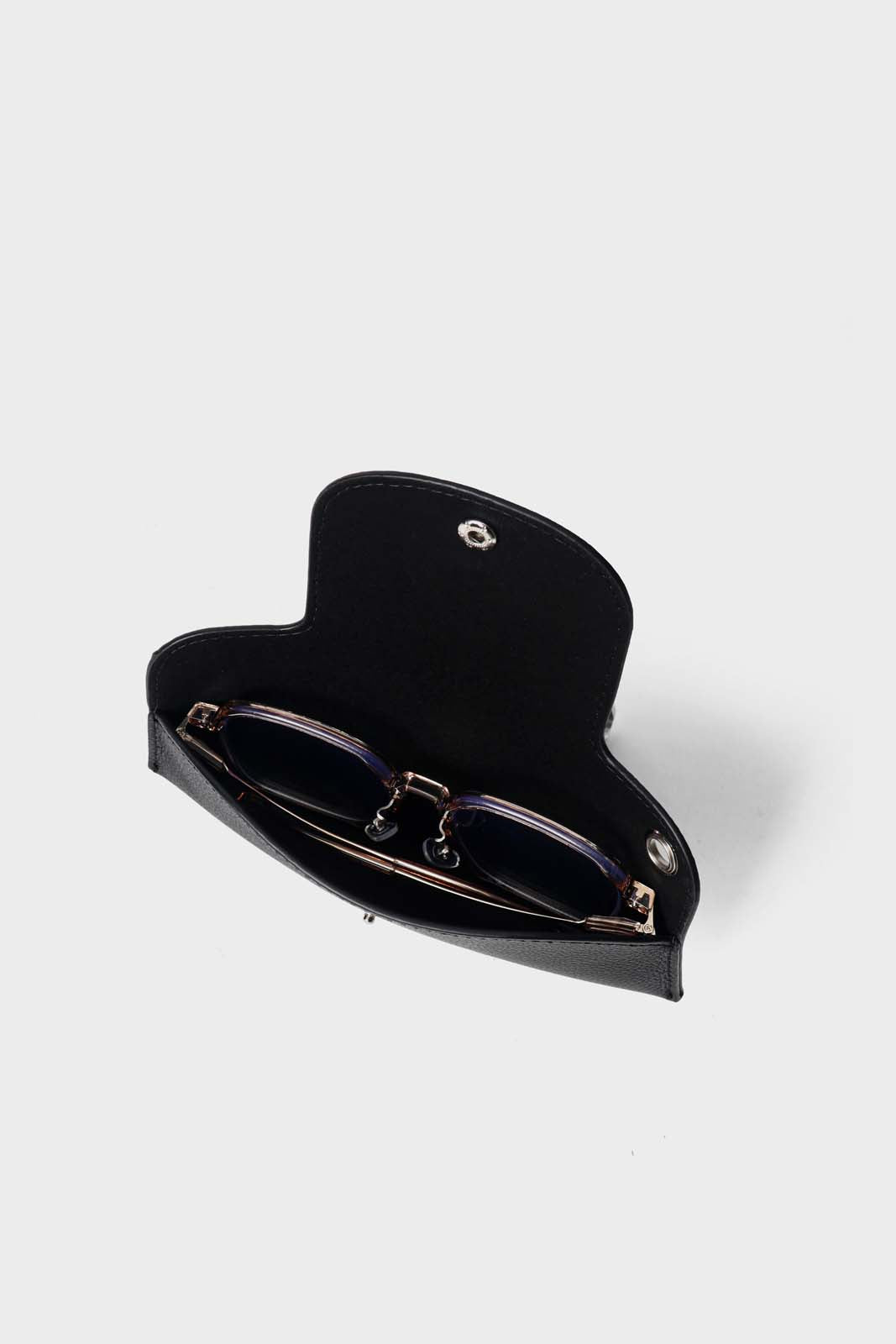Black eyeglass case with glasses inside