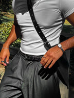 Model wearing Kite Luxe Bag crossbody outdoors