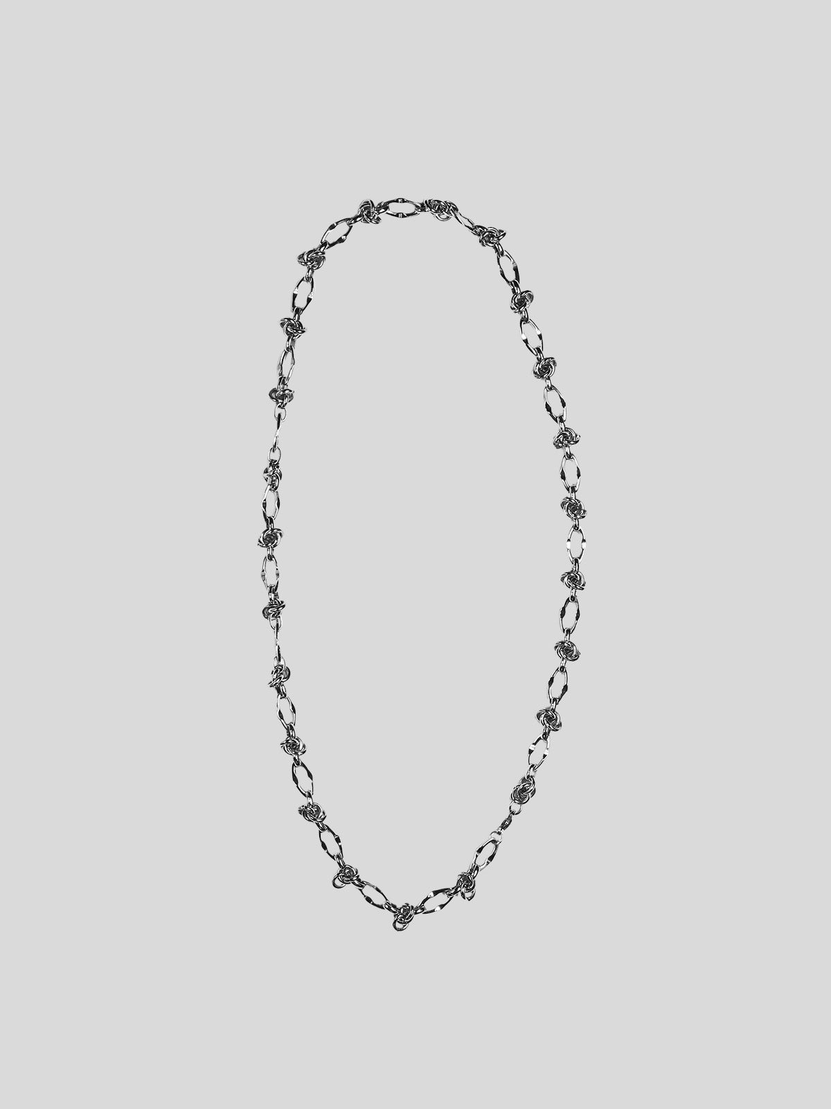 Varna  stainless steel necklace on plain background