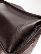 Brown Willow Bag close up of embossed 'Late to Work' leather on side of bag