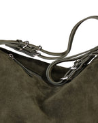 Close up of Green Suede Willow Bag straps